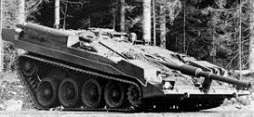 A black and white photo of a tank driving down a road.