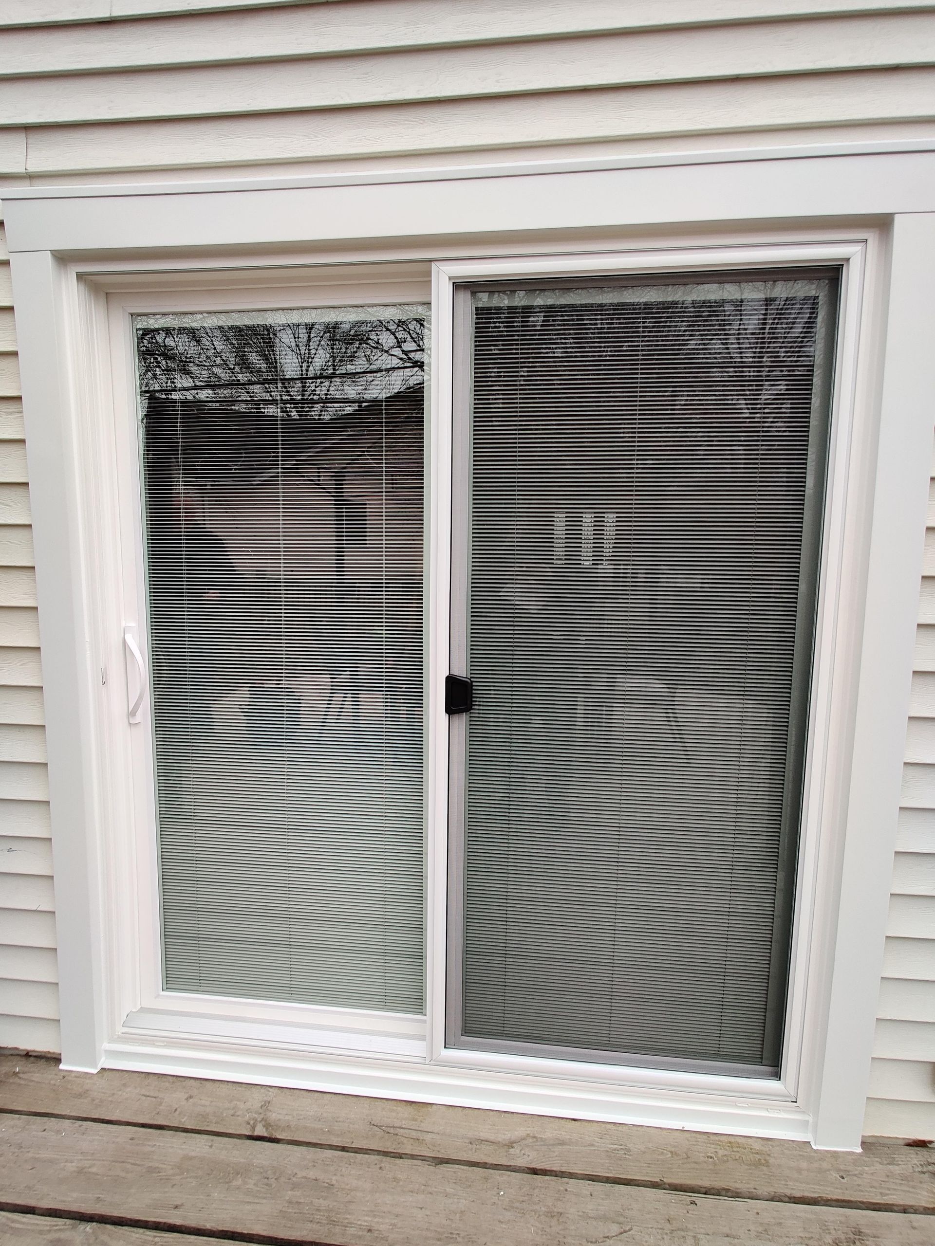 Brand new 6-foot sliding patio door.