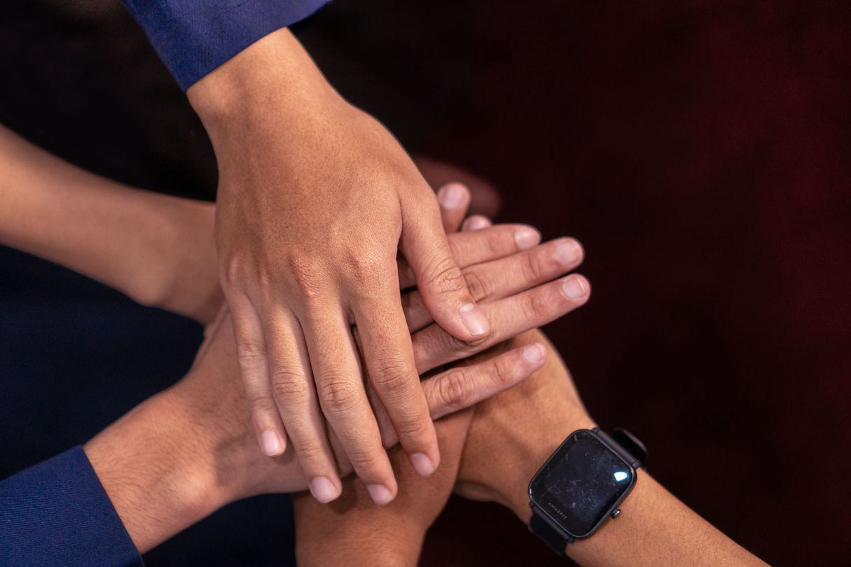 Hands on top of each other