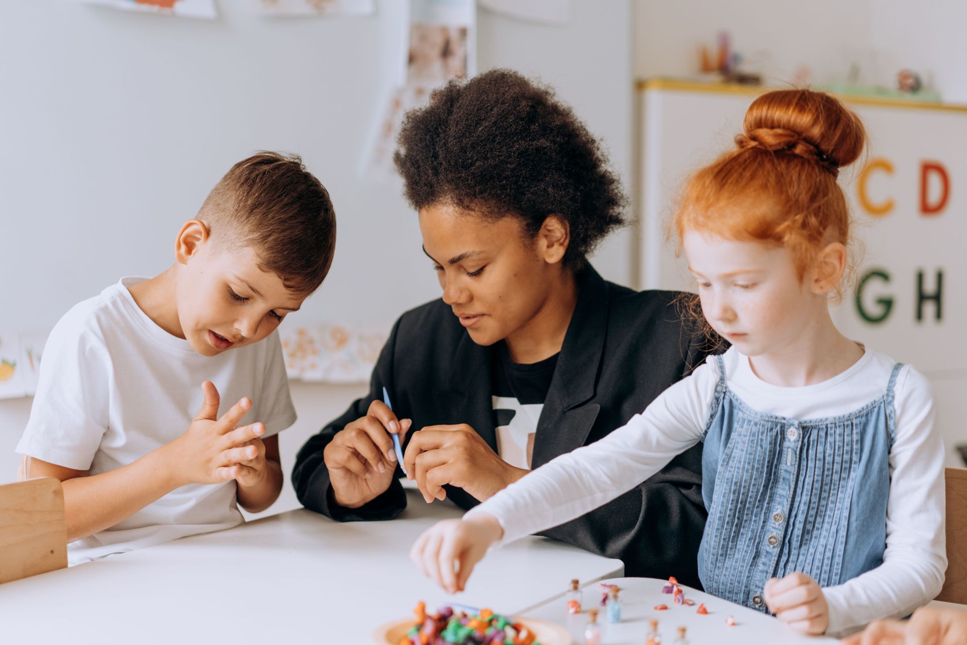 Woman playing with children