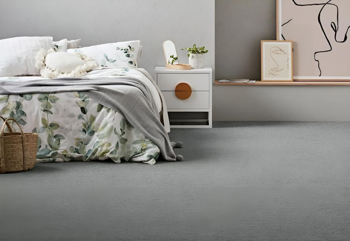 A Bedroom With a Bed, Nightstand, and Painting on the Wall — Aussie Carpets & Vinyl In Beerwah, QLD