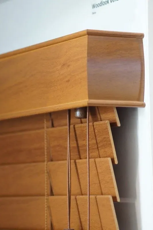 A Close Up of a Wooden Blind on a Window — Aussie Carpets & Vinyl In Beerwah, QLD