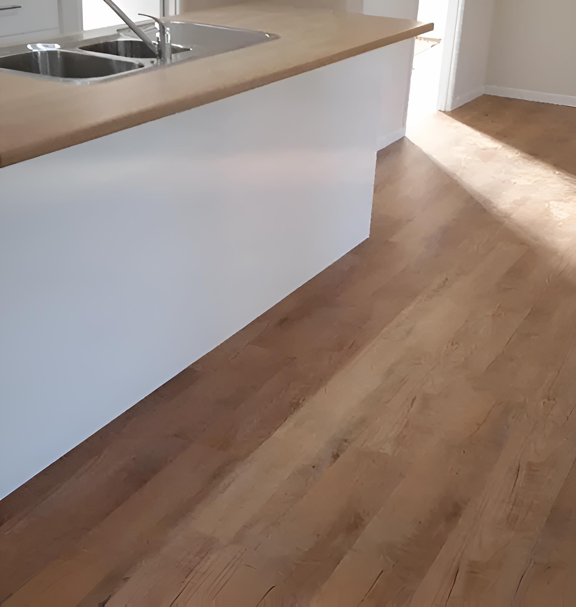 A Kitchen With Two Sinks and a Wooden Floor — Aussie Carpets & Vinyl In Beerwah, QLD