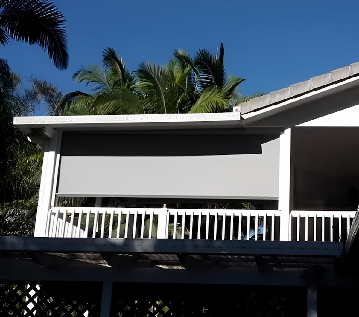 A Balcony With a White Railing and a Gray Awning — Aussie Carpets & Vinyl In Beerwah, QLD
