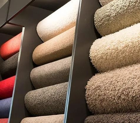 Several Rolls of Carpet Are Stacked on Top of Each Other — Aussie Carpets & Vinyl In Beerwah, QLD