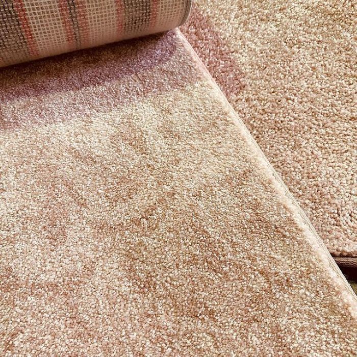 A Close Up of a Carpet on a Wooden Floor — Aussie Carpets & Vinyl In Maleny, QLD