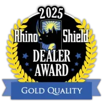 2025 Rhino Shield Dealer Award emblem with gold laurel and blue Gold Quality ribbon