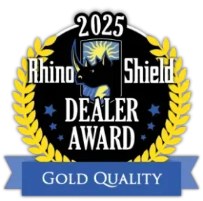 2025 Rhino Shield Dealer Award emblem with gold laurel wreath and blue “Gold Quality” ribbon