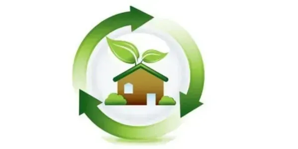 Green recycling arrows circle a house with leaves, symbolizing eco-friendly home sustainability.
