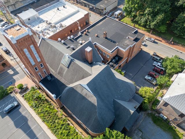 Before: aerial view of the downtown Staunton church roof