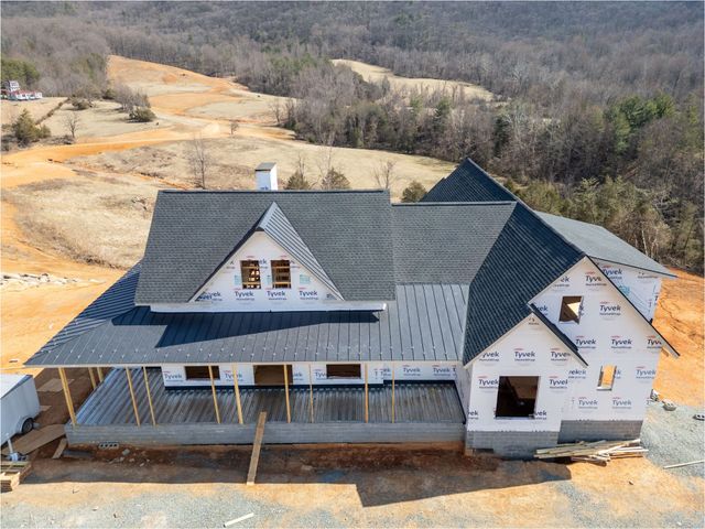 New construction roof with a metal porch roof in Crozet, VA