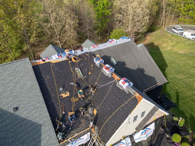 Baber crew installing underlayment during a roof replacement in Fishersville, VA