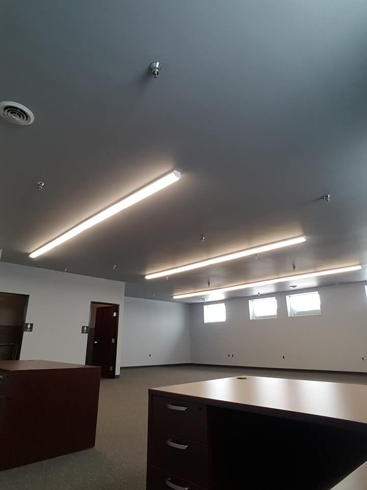 A freshly finished garage ceiling with lights