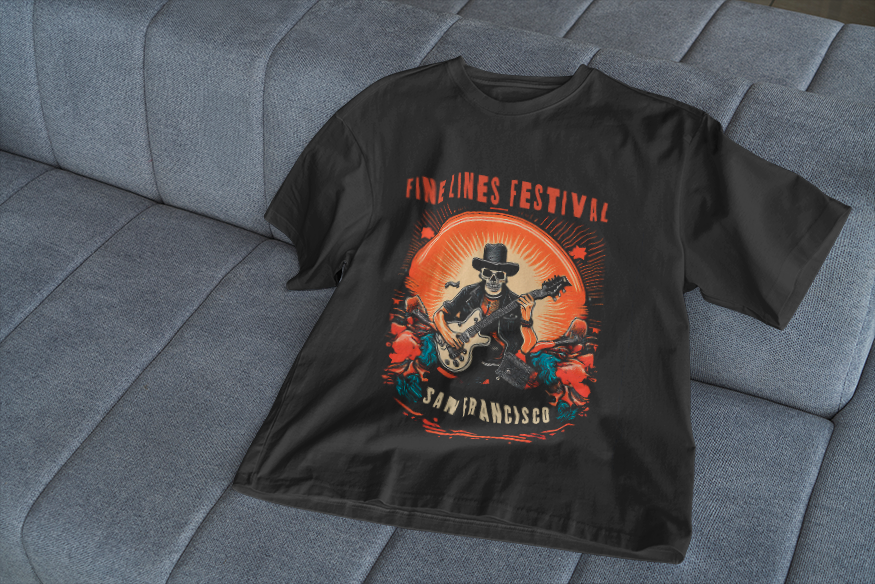 Roland DG TY-300 DTF example showing bright orange hues on a black tee