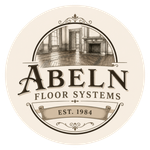 Abeln Floor Systems logo in beige and brown with decorative room sketch and “Est. 1984” text