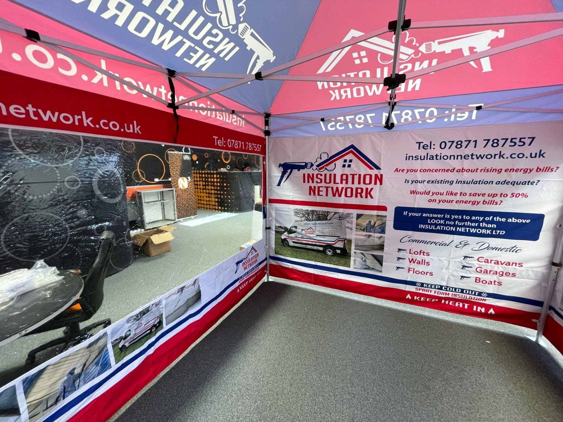 A tent with a sign that says insulation network on it