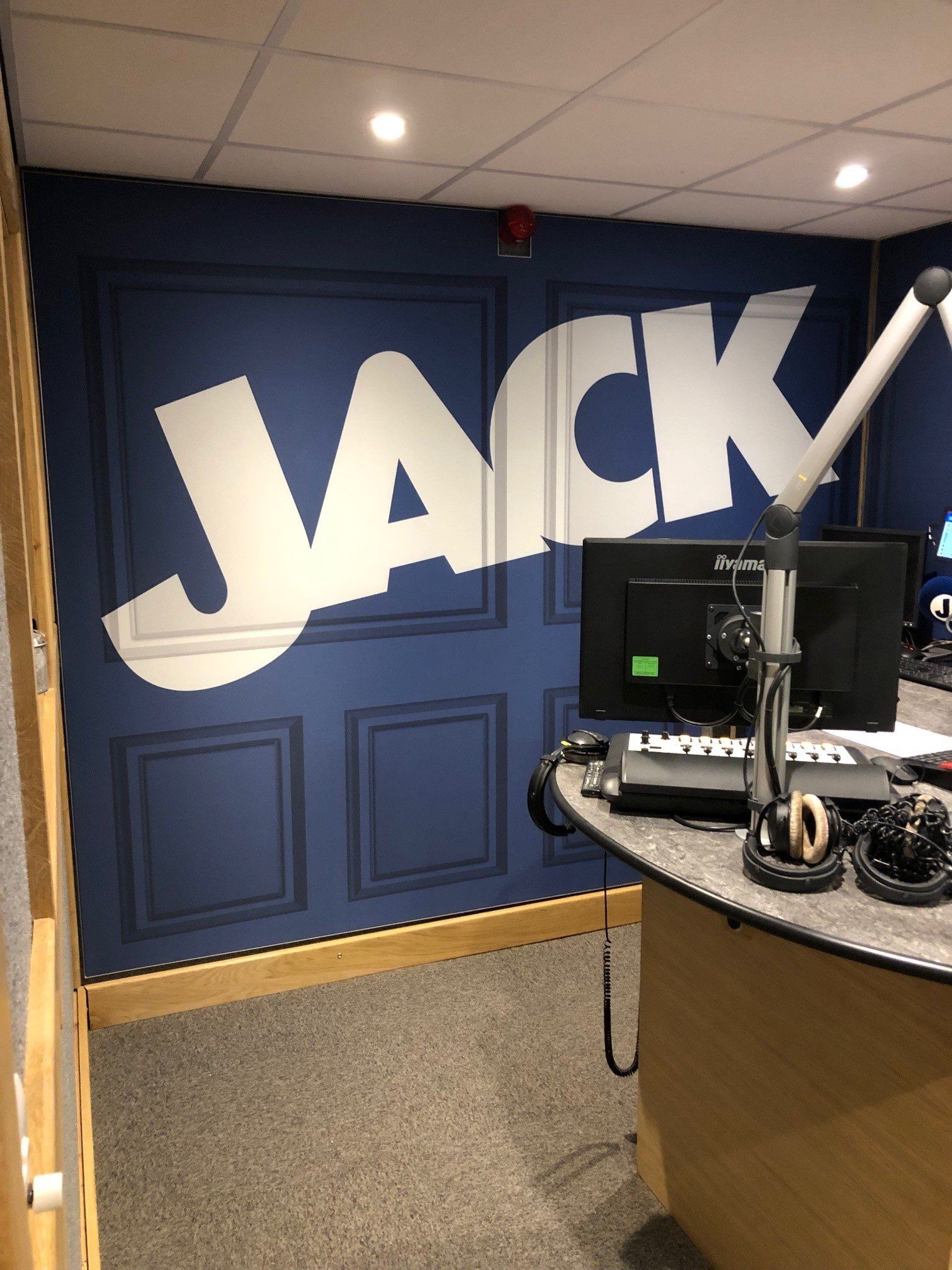 A room with a sign on the wall that says jack
