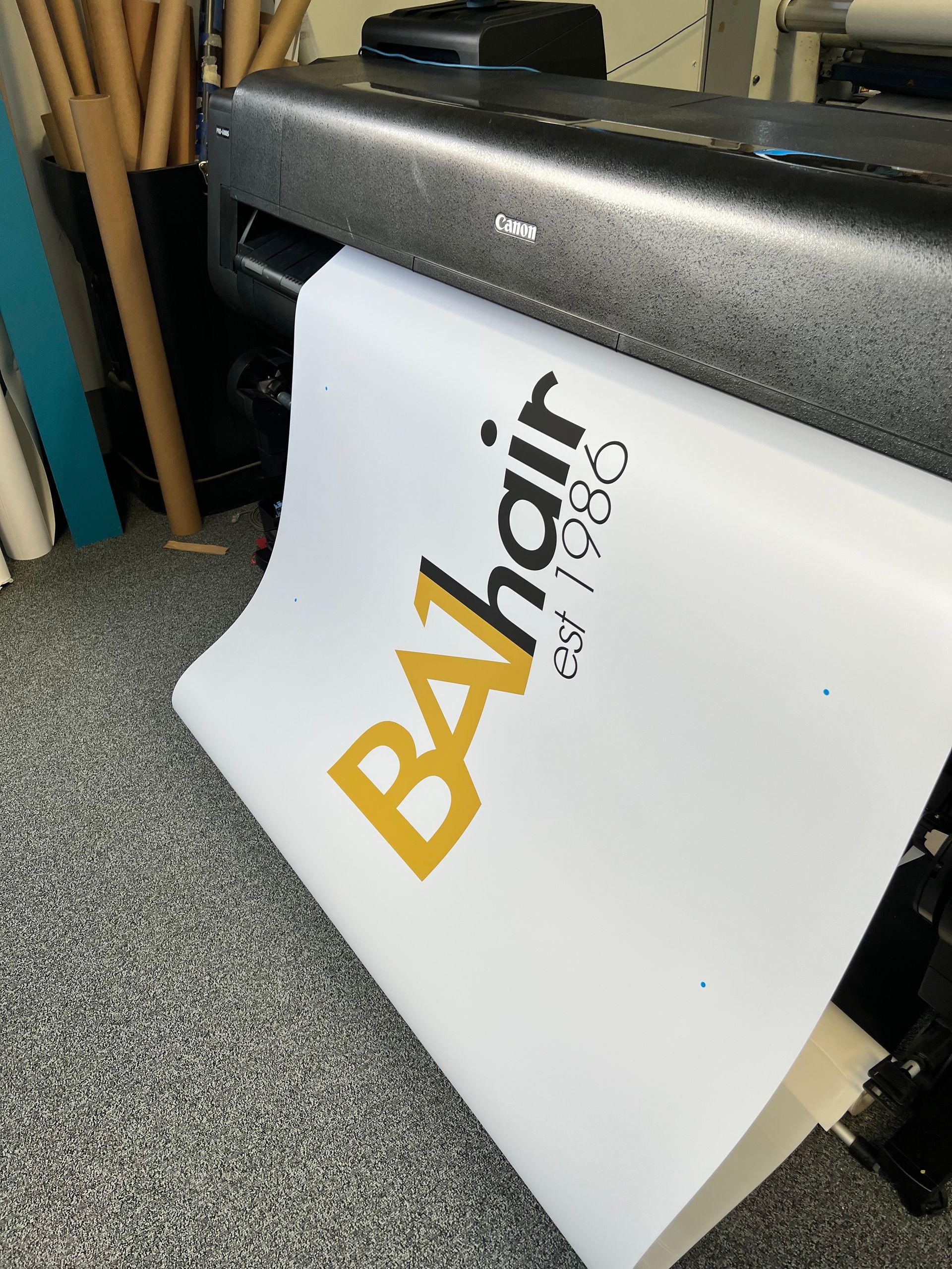 A large piece of paper that says balhair on it
