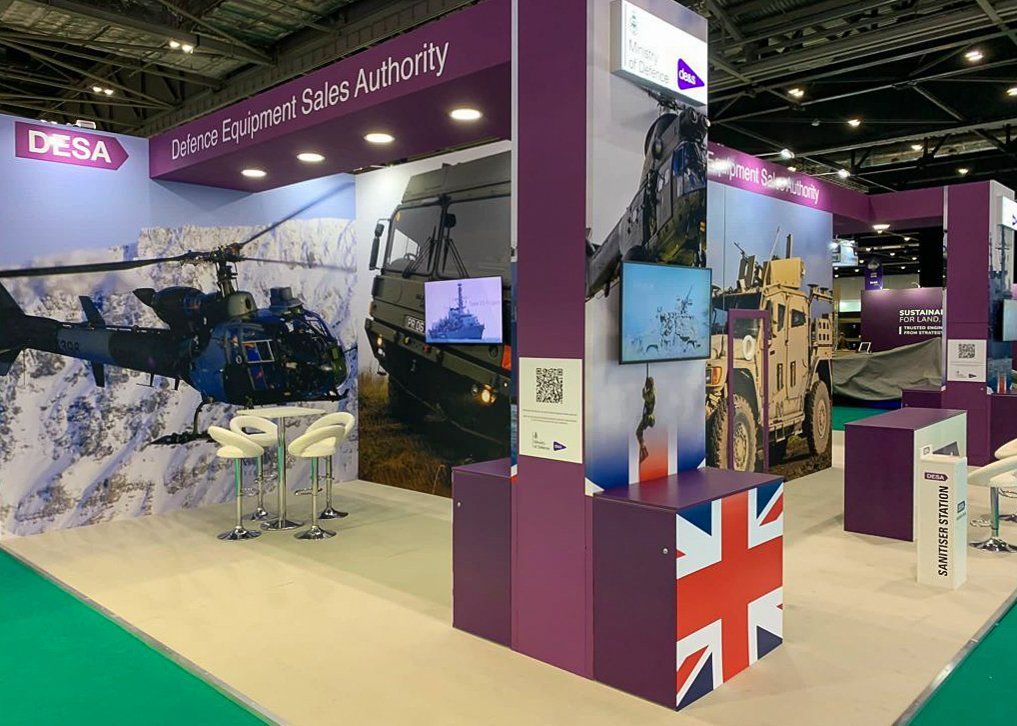 A purple booth with a british flag on it.
