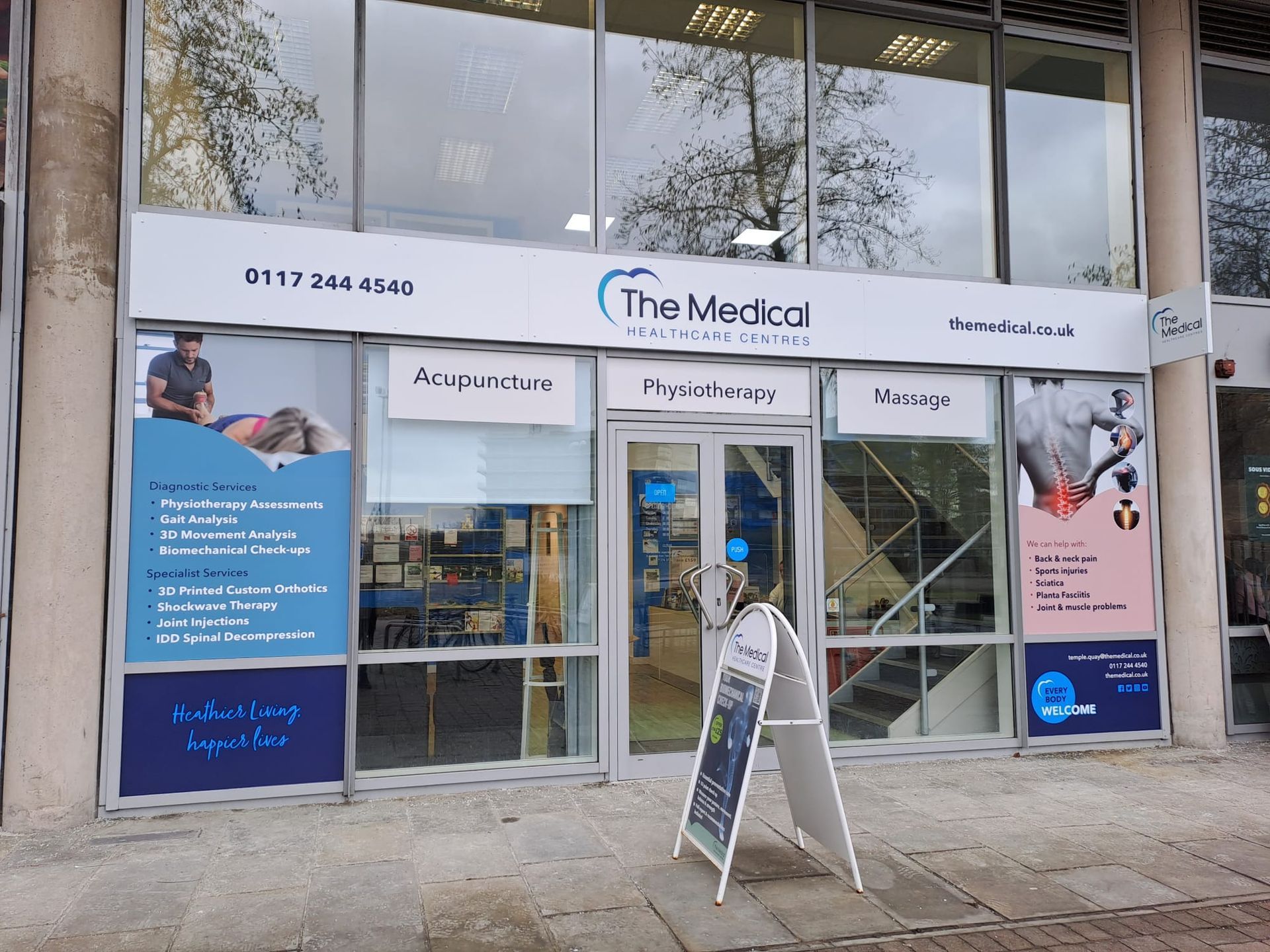 A building with a sign in front of it that says the medical