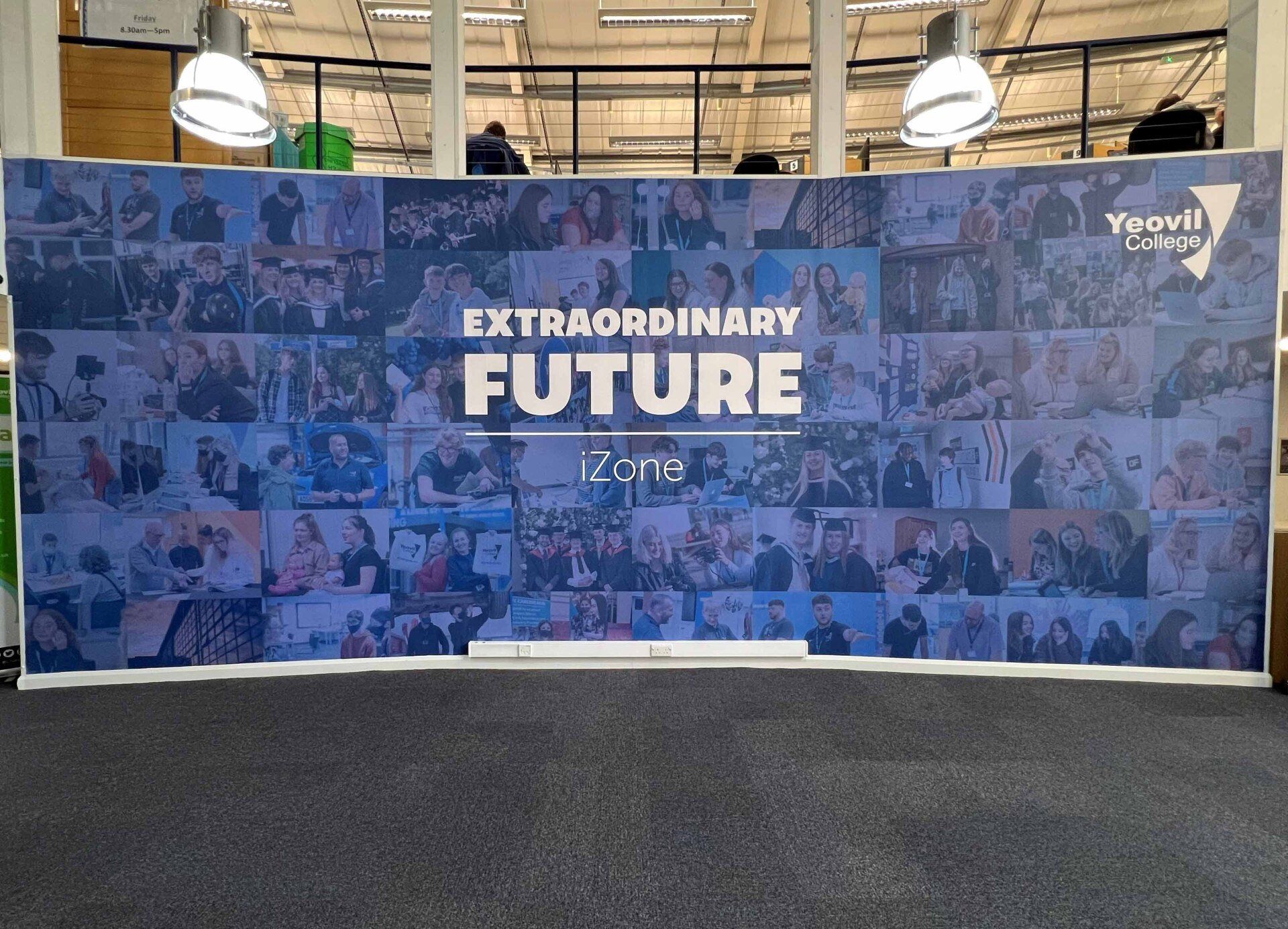A large poster that says extraordinary future on it