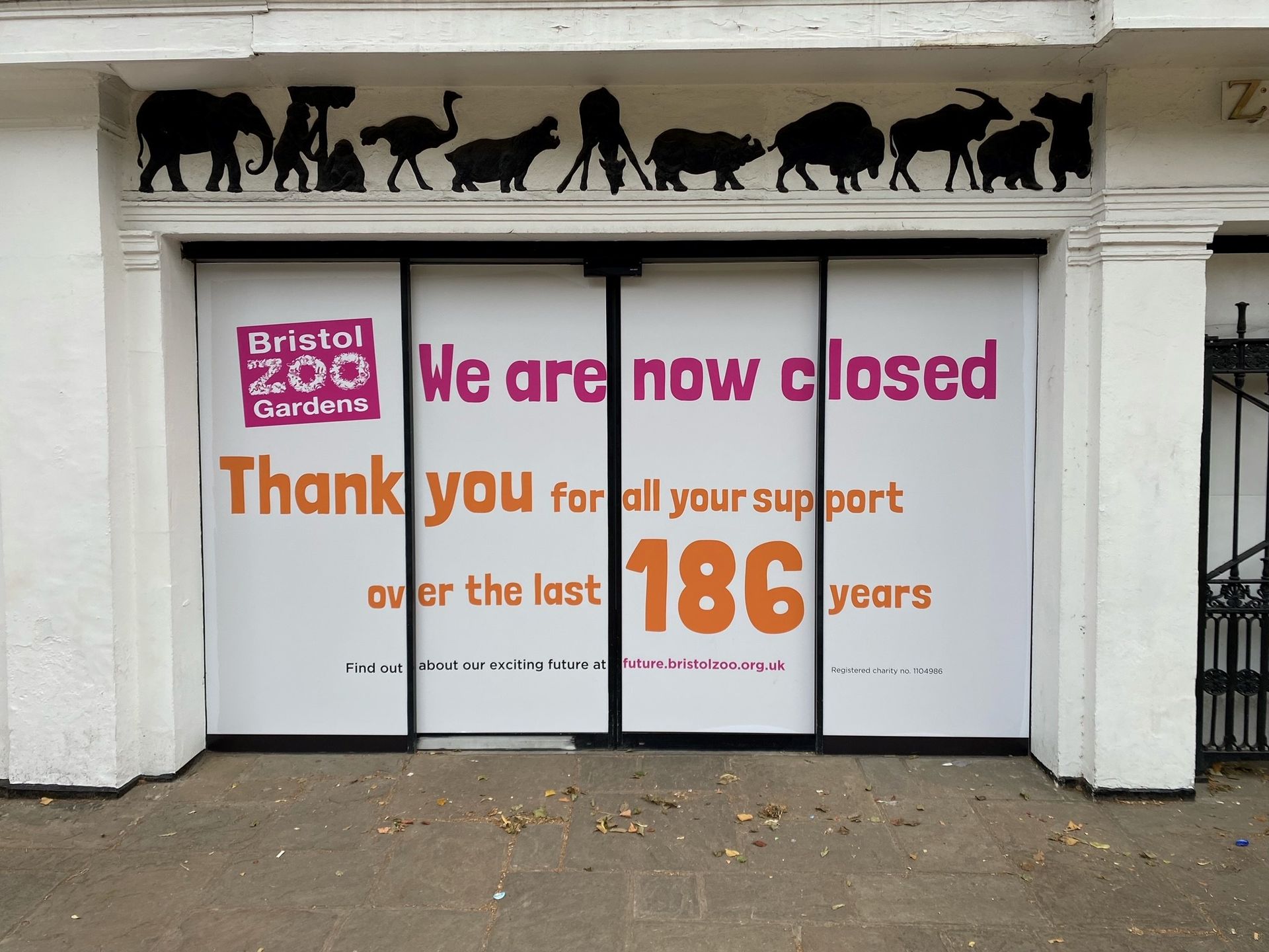A sign on a building that says we are now closed