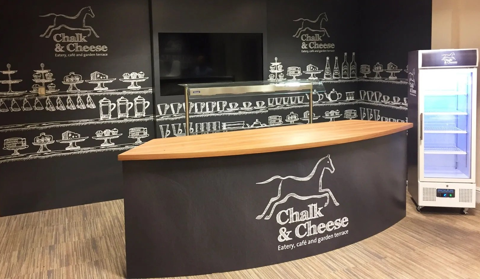 A counter with chalk and cheese written on it