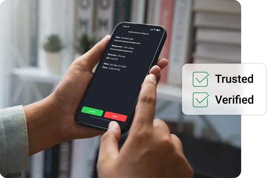 Person holding a phone displaying data with 