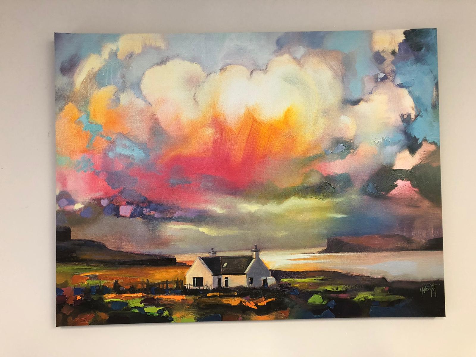 A painting of a house on the shore of a lake with a cloudy sky in the background. Dramatherapy Ireland