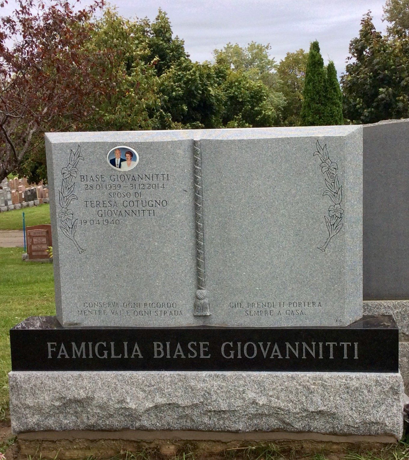 Gray granite family headstone,
