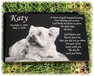 Black granite pet memorial with a photo of a dog named Katy and a poem about her passing.