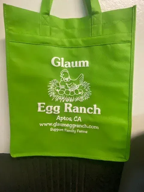 A T-shirt with a Logo on it is Being Printed on a Machine — Soquel, CA — Sport About Graphics