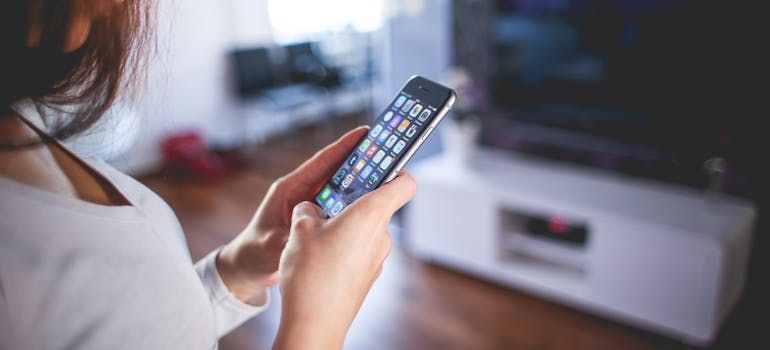 a woman using her smartphone