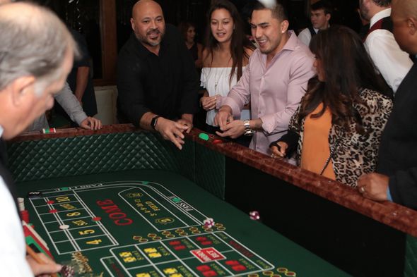 Croupier Holds A Roulette Ball — San Diego, CA — Casino Knight