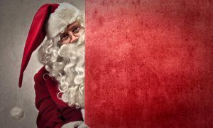 Sneaky Santa is hiding behind this corner to remind you to reward your customers!