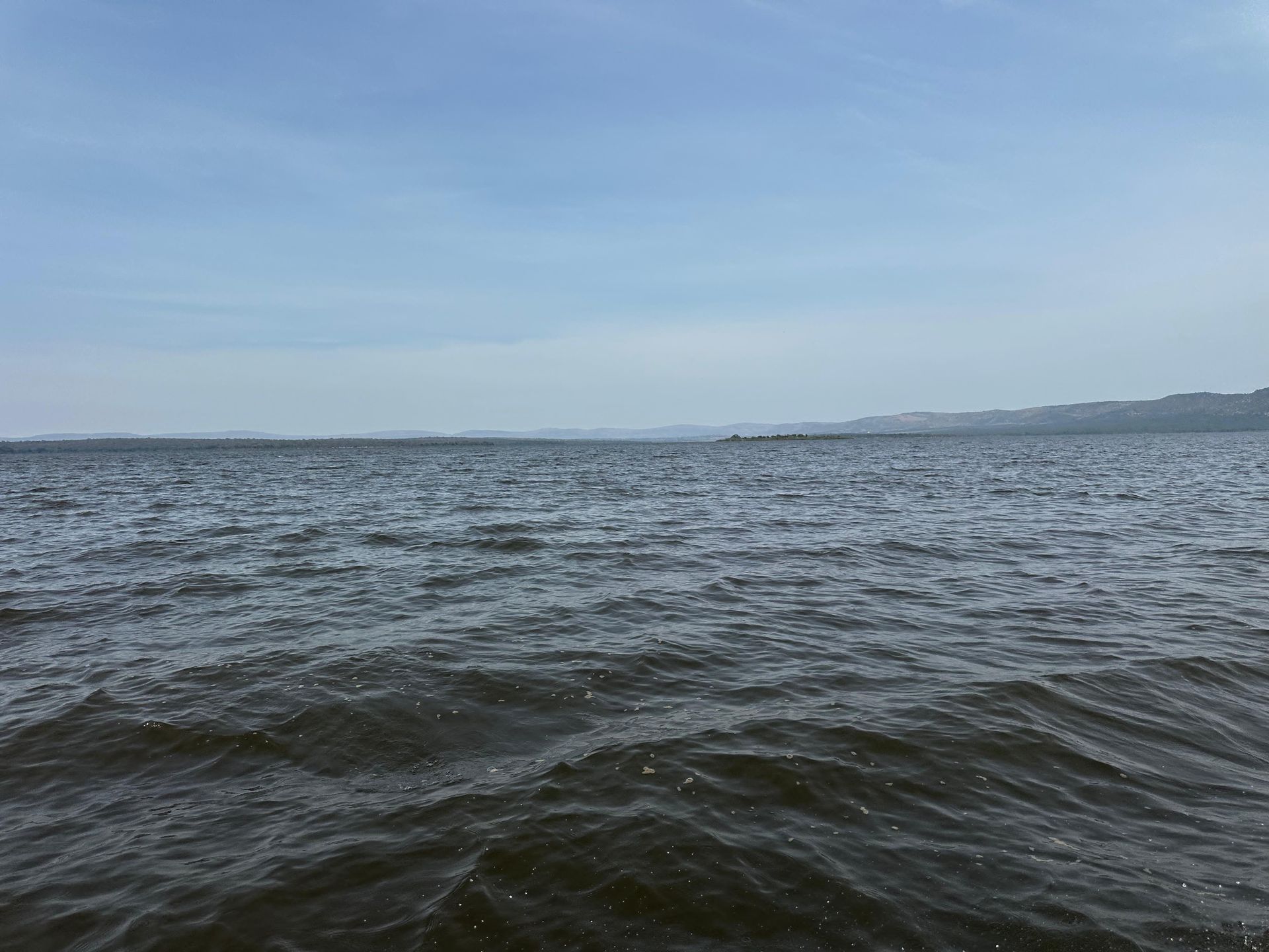 Open water view across Lake Ihema during the boat safari
