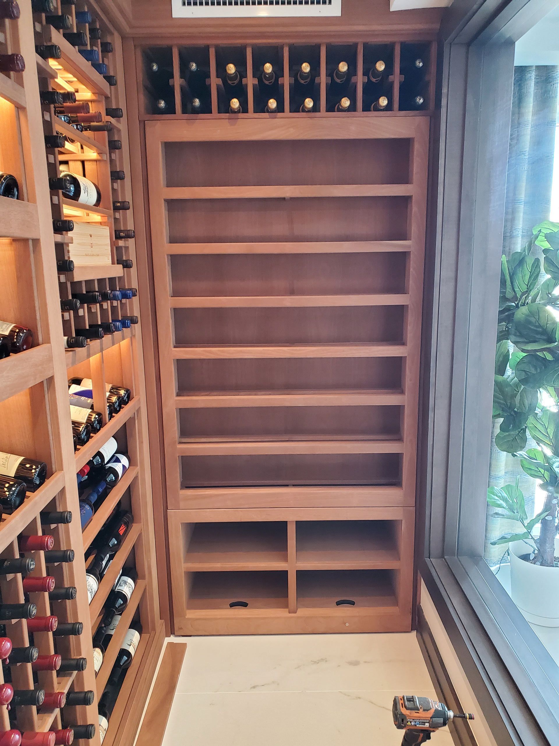 A wine cellar filled with lots of wine bottles