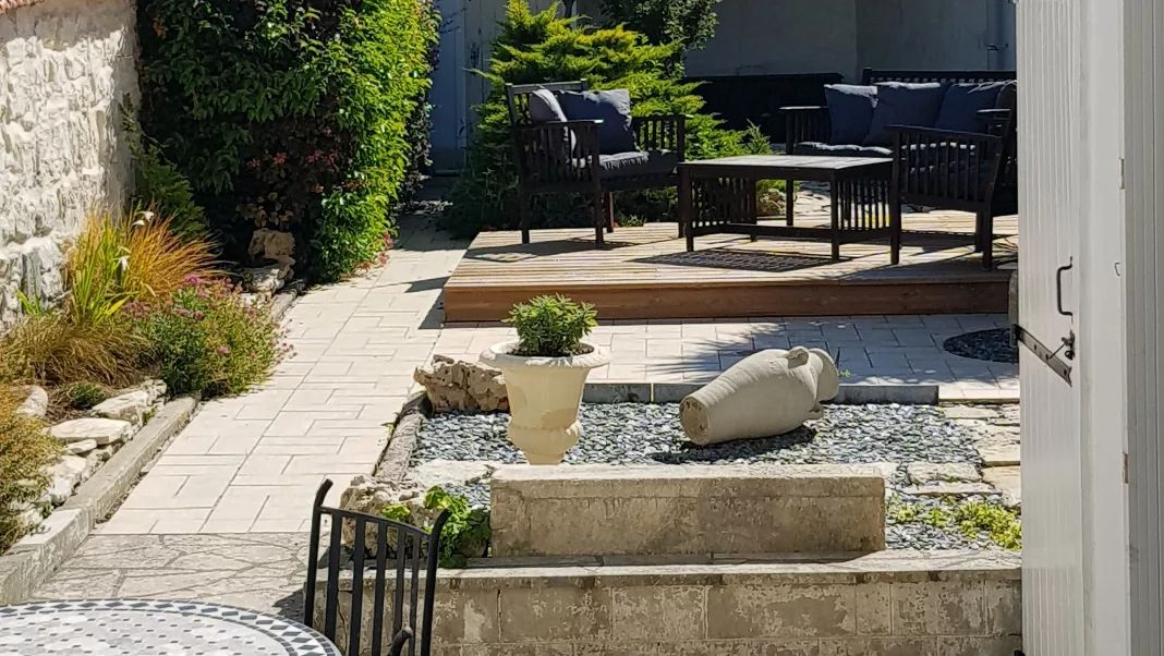 patio terrace with faux roman pots