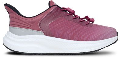 Pink athletic sneaker with white sole, side view