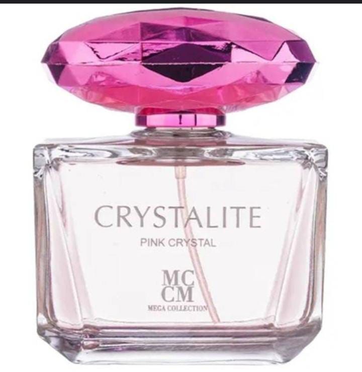 Frasco de perfume Pink Crystalite con tapón rosa facetado y cuerpo de vidrio transparente.