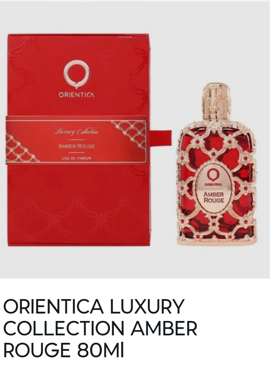 Frasco de perfume Red Orientica Luxury Collection Amber Rouge de 80 ml con caja a juego.