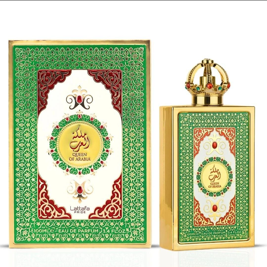 Frasco de perfume árabe verde y dorado y caja a juego con detalles florales rojos ornamentados.