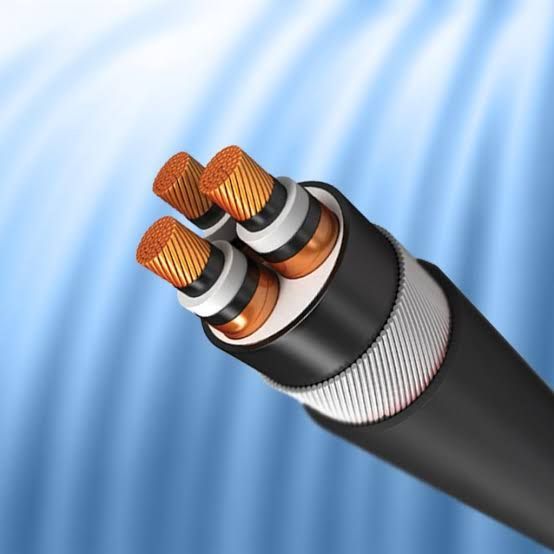 Cross-section of a black electrical cable with copper wires and orange insulation on a blue background