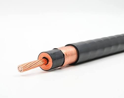 Cutaway of a black electrical cable showing copper conductor and insulation layers