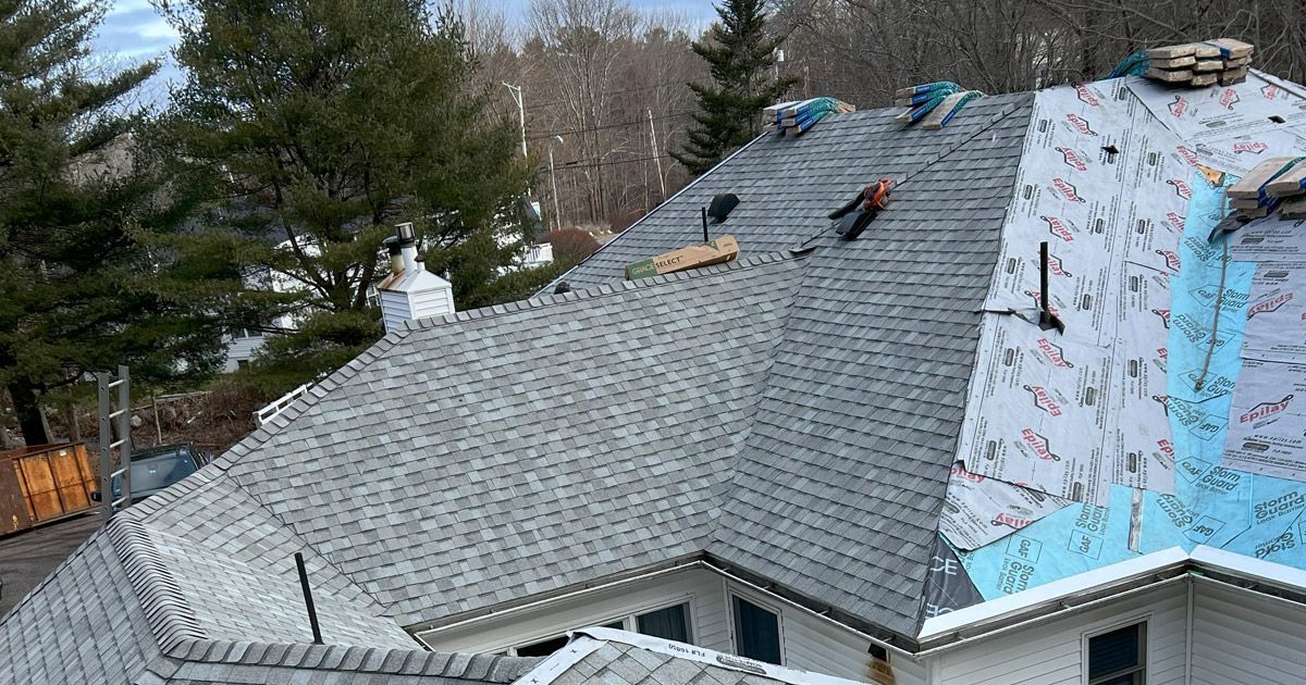 workers repairing a roof