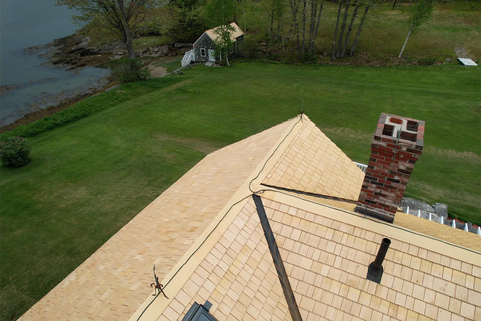 photo of hand fixing roof