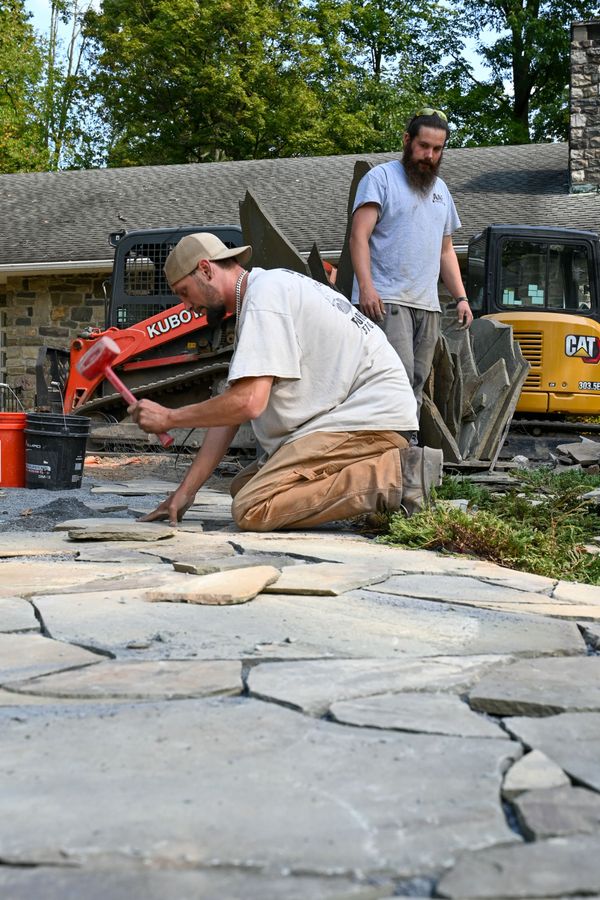 A.A.F Landscapers working on commercial landscaping