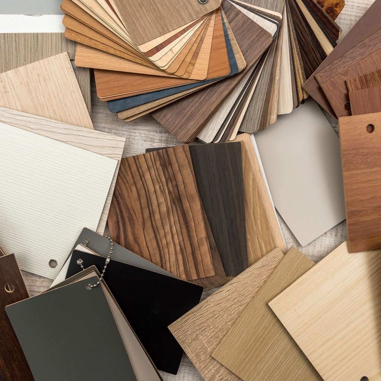 A bunch of different types of wood samples on a table