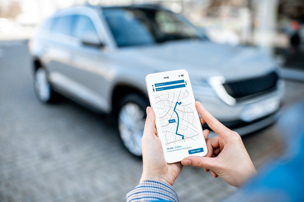 Woman Using an App for Her Car