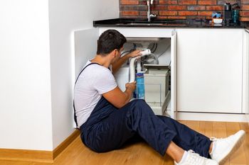Man Repairing Drain Pipe – Melbourne, VIC – Catco Plumbing